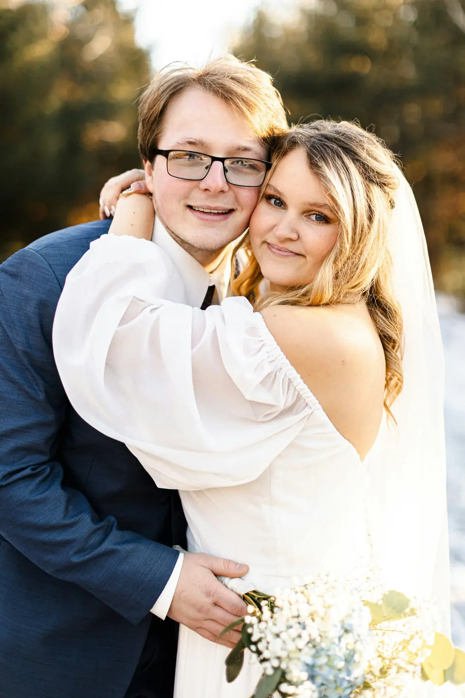 Newlyweds embracing and smiling