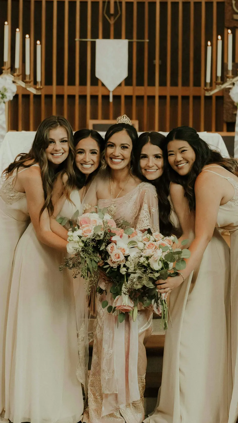 A bride and her bridesmaids holding bouquets